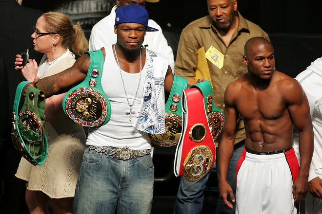 Photos - Rapper 50 Cent holds up FLOYD MAYWEATHER Jr. belts at the ...